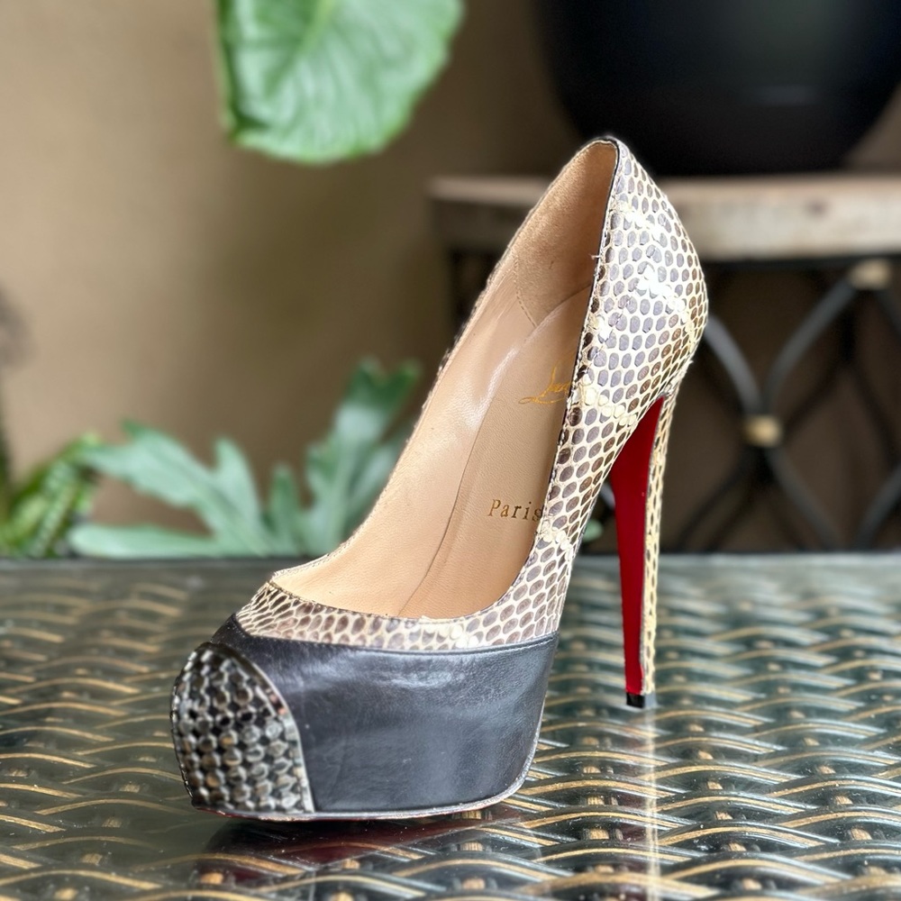 CHRISTIAN LOUBOUTIN snake skin, metal toe platform pumps